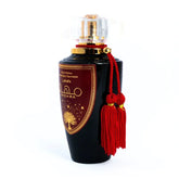 Lattafa Parfum Mohra met zwart flesje en rode tassels, geur parfum Mohra